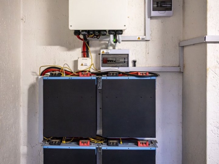 Inverter and battery bank installed on a wall